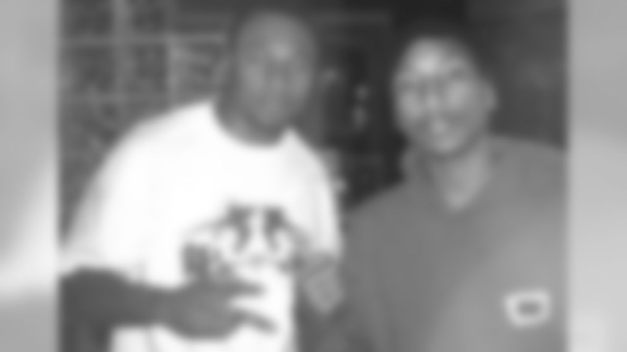 Antoine Bethea with Pharrell Williams