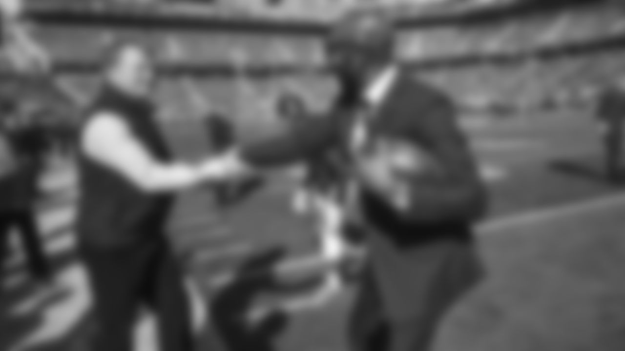 Roger Goodell and Jerry Rice