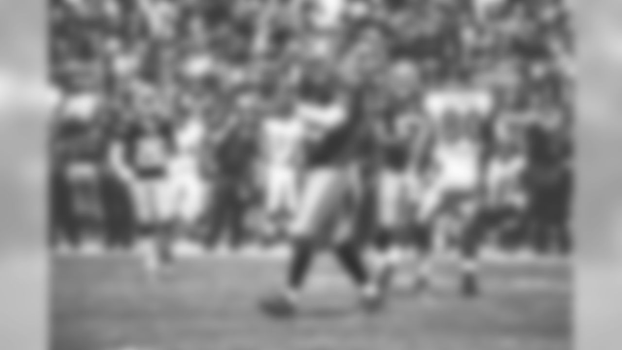 Defensive end Tony Jerod-Eddie shortly after batting down a pass thrown by Ravens QB Joe Flacco.