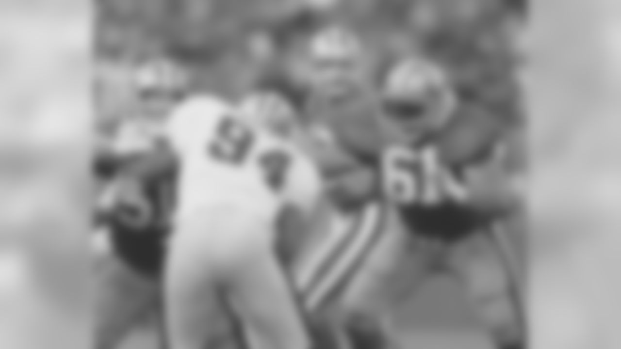 QB Joe Montana, C Randy Cross and G Jesse Sapolu