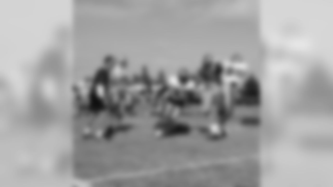 Coach Nolan watches the Oklahoma drill
