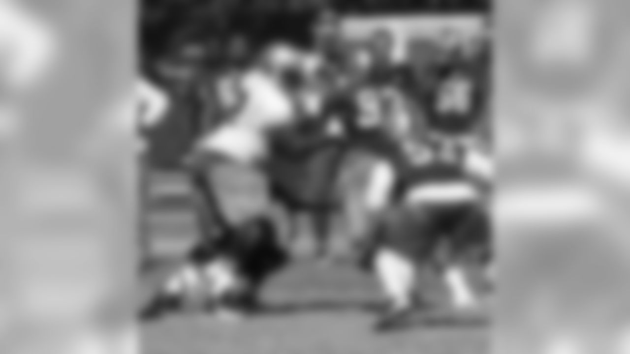 G Chilo Rachal blocks a defensive linemen