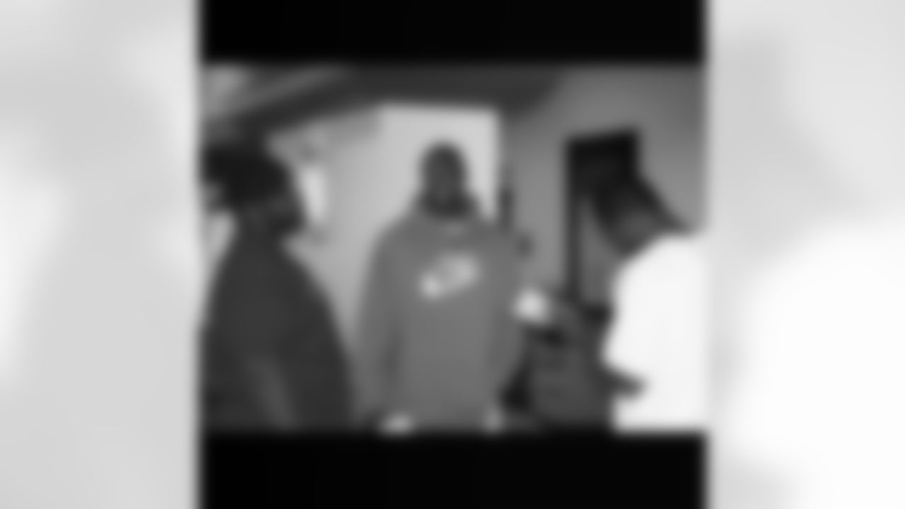 Aubrayo Franklin, Manny Lawson and Marcus Hudson