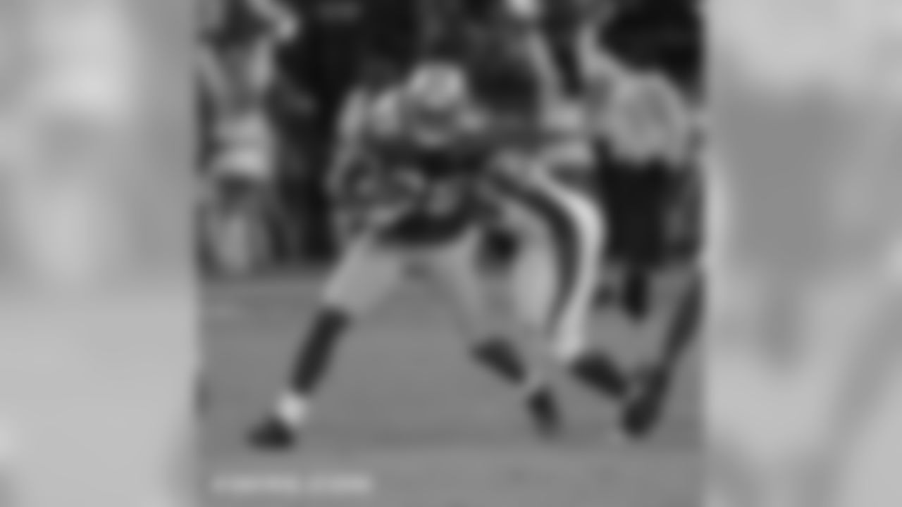 Brown returns an intercepted pass up the field.