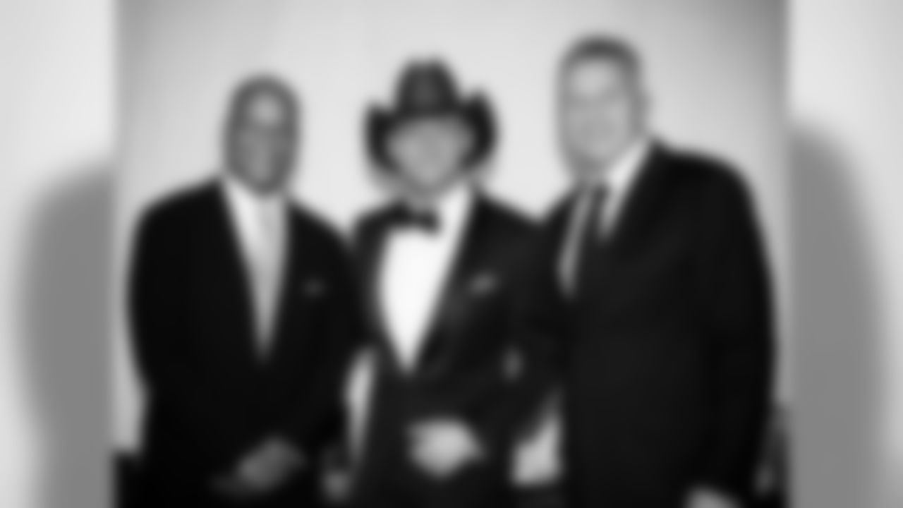 Joe Montana and Ronnie Lott with Tim McGraw