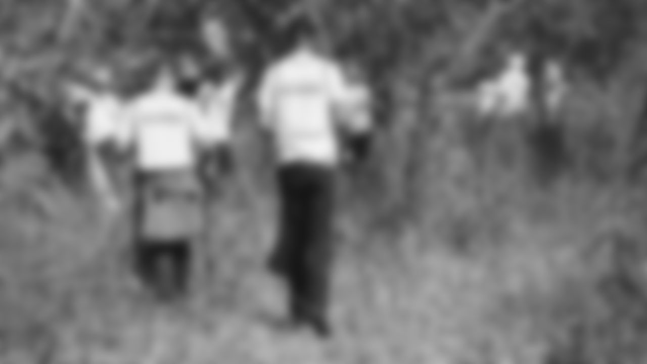 Azeez Al-Shaair and Front Office Staff Participate in Creek Clean-Up