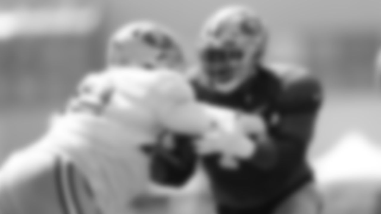 DL Zach Kerr, OL Laken Tomlinson