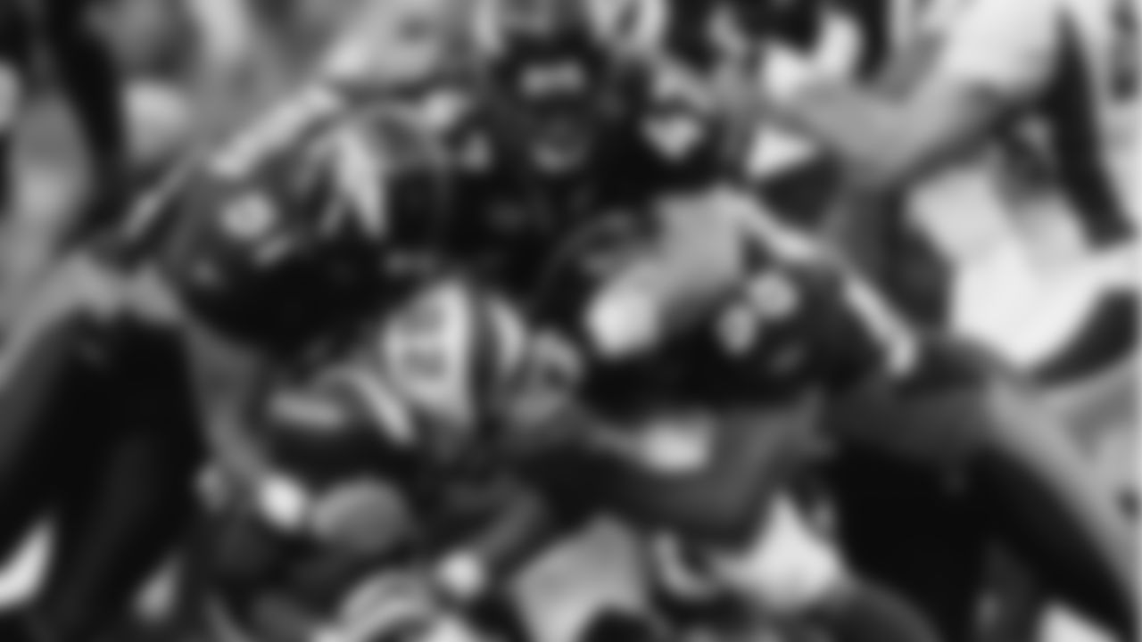 Adrian Peterson, Jamie Winborn, John Lynch, D.J. Williams