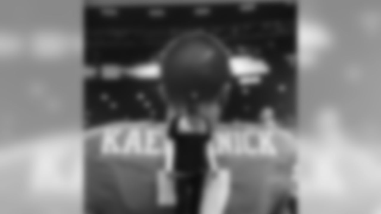 Colin Kaepernick in front of Colin Kaepernick.
