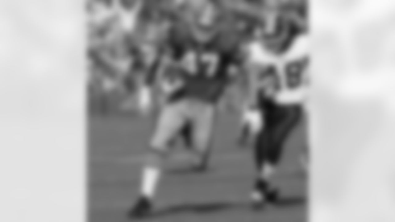 TE Billy Bajema runs with the ball after making a tough over-the-shoudler c