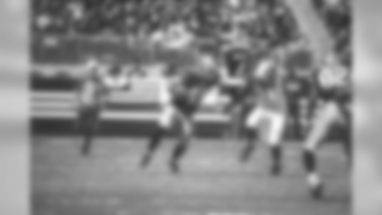 Miller takes care of the rest with a stiff-arm and a 28-yard gain.