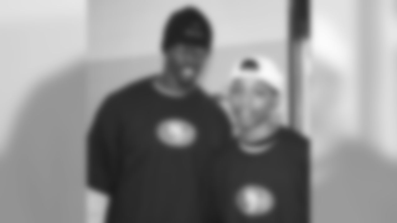 WR Jason Hill and volunteer at Hometown Huddle