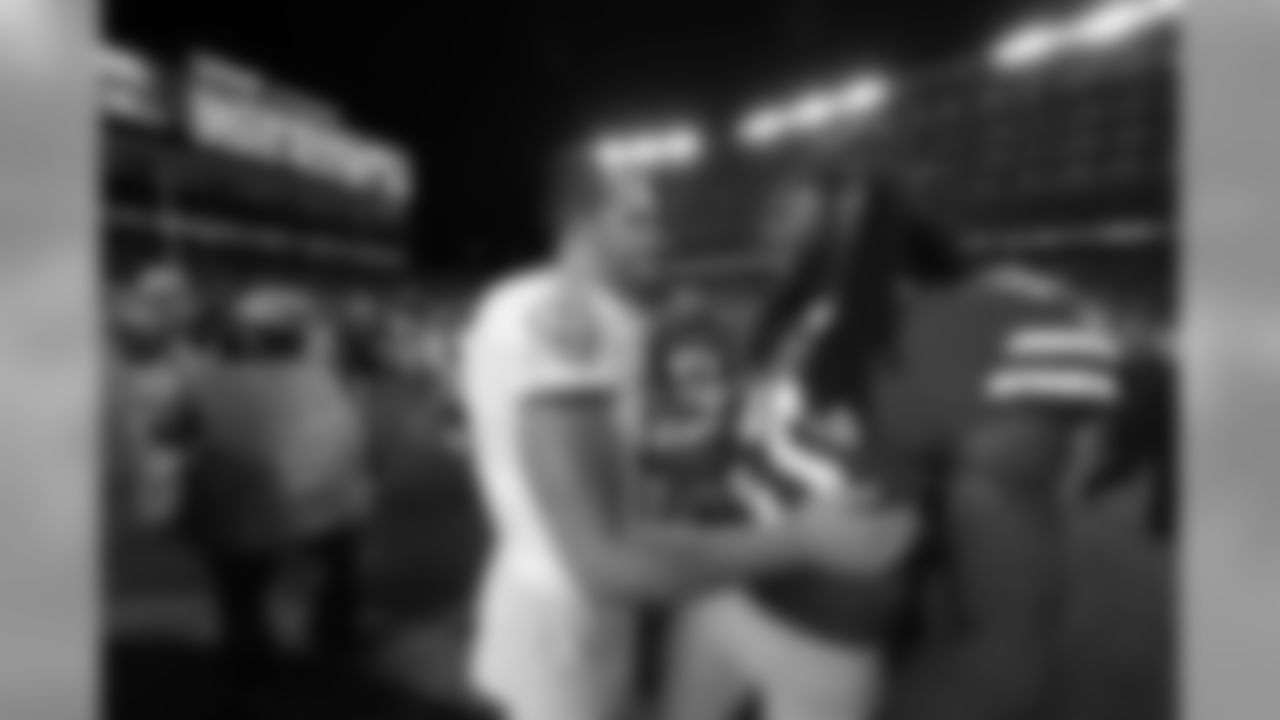 CB Richard Sherman and Raiders QB Derek Carr