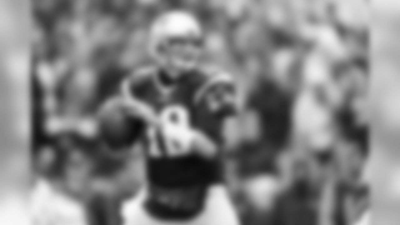 QB 12 Tom Brady