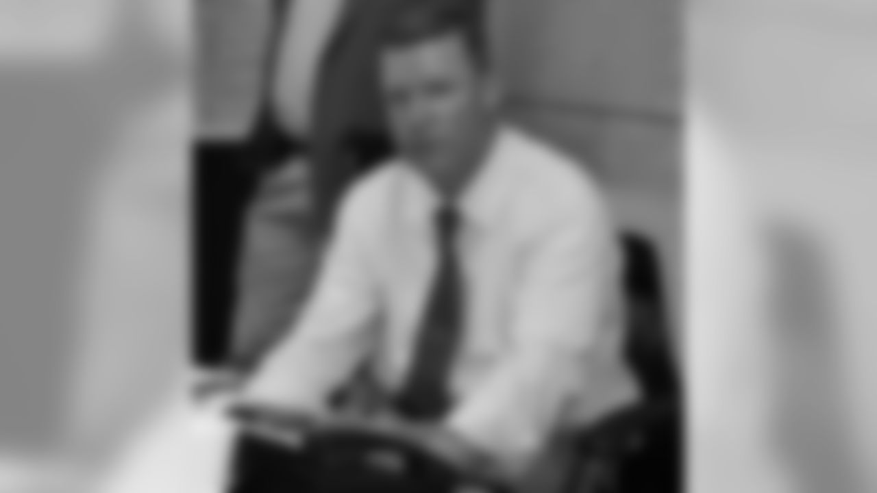 General Manager Scot McCloughan studies his Draft Board
