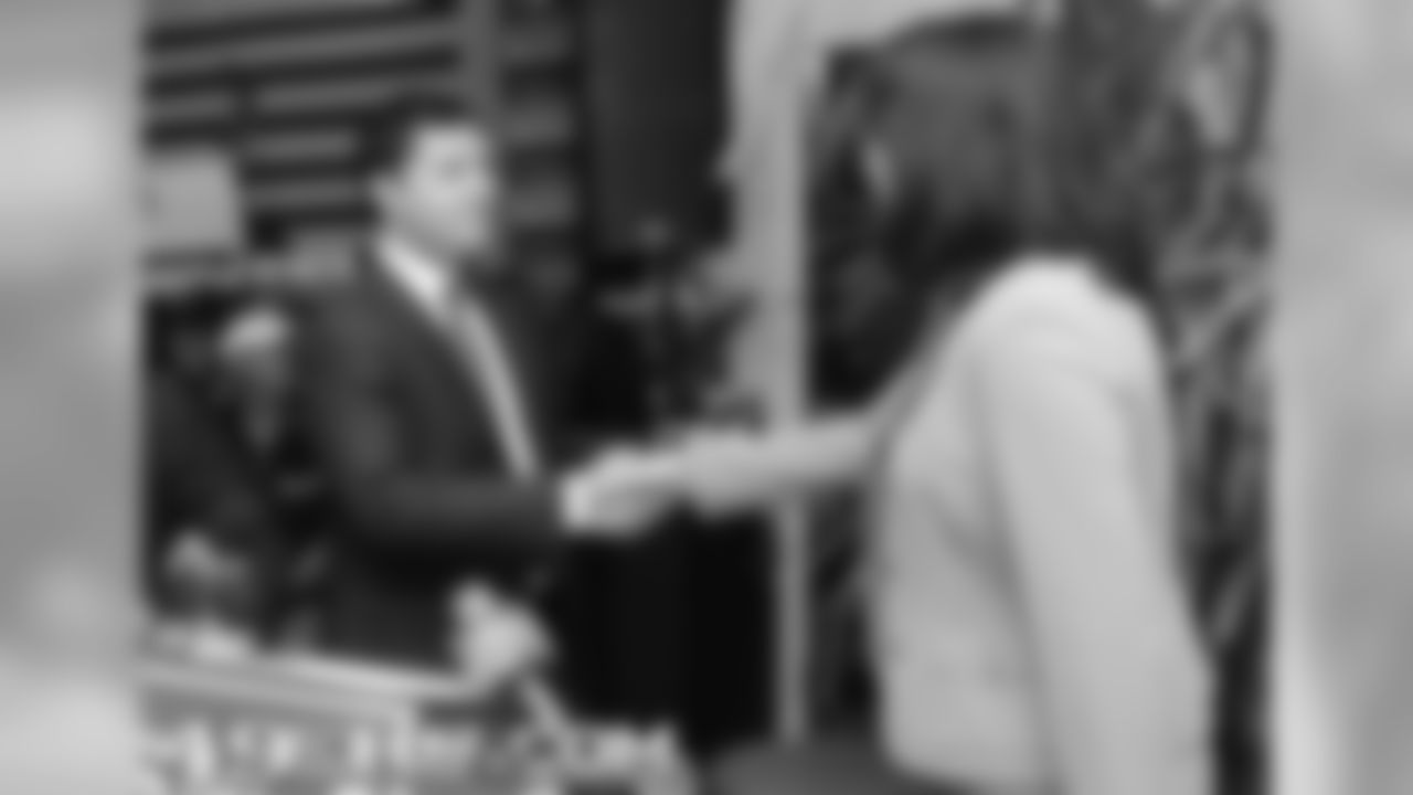 49ers President/CEO Jed York shakes hands with mayor Mahan