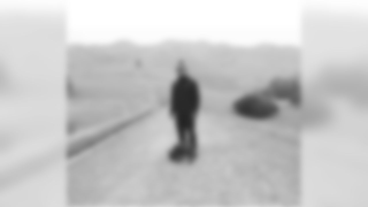 Carlos Hyde takes his dog Max for a walk.