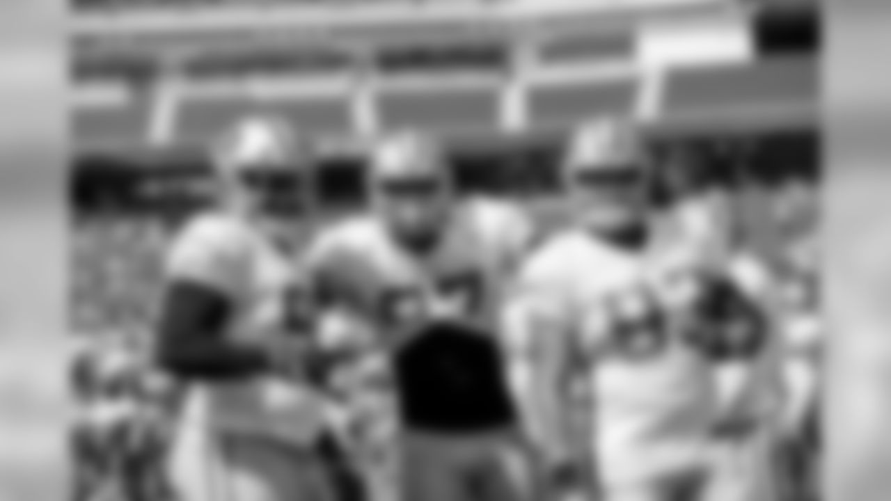 (From left to right) NT Earl Mitchell, LB Dekoda Watson and DL Chris Jones.