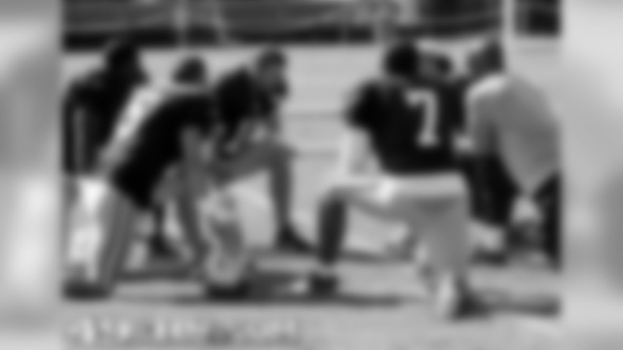 Quarterbacks after practice