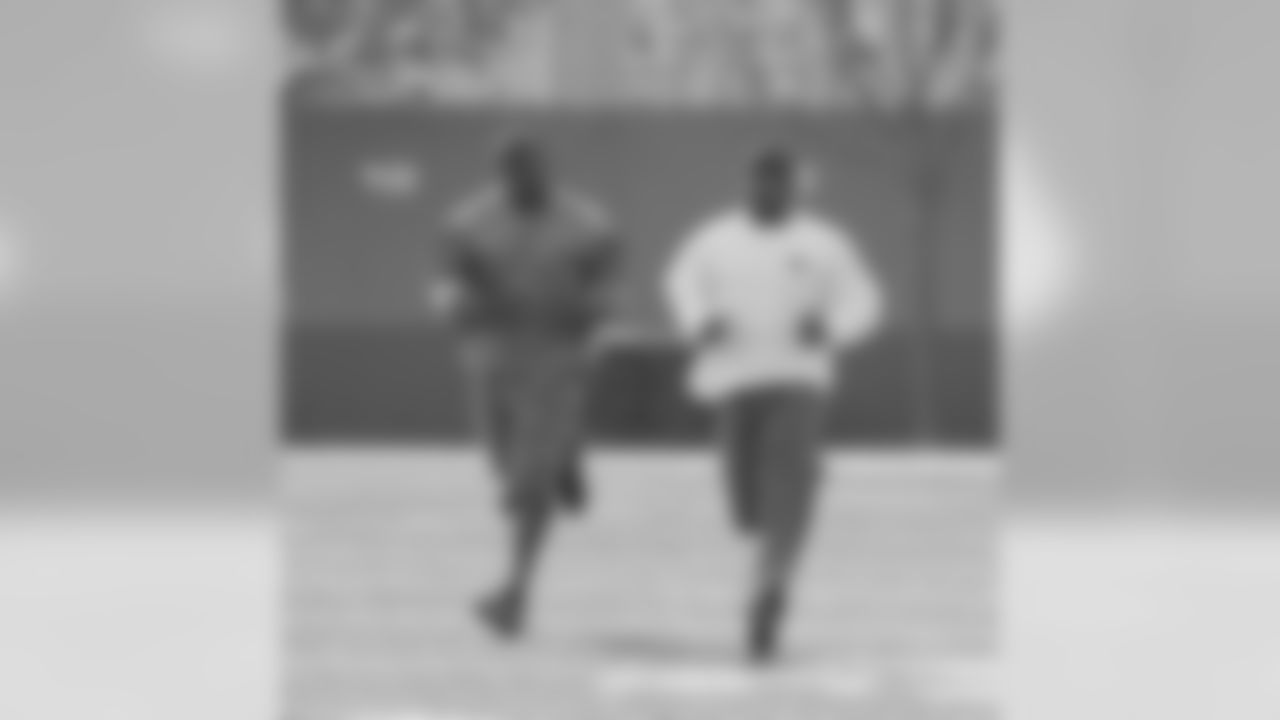Safety Michael Lewis and CB Tarell Brown