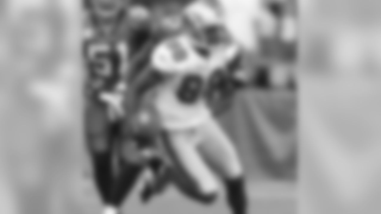 WR Isaac Bruce finished with 153 yards receiving