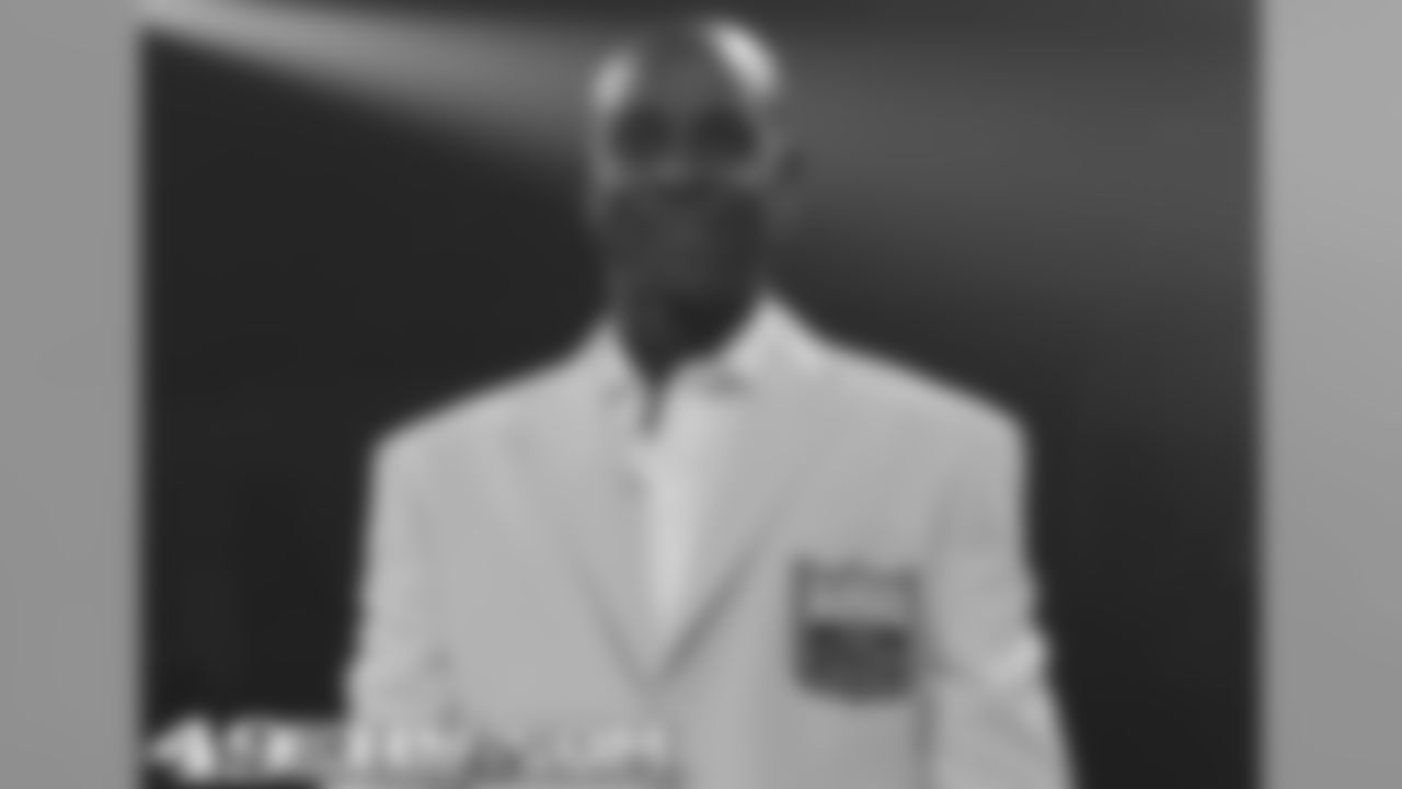 Jerry Rice in his gold Hall of Fame jacket