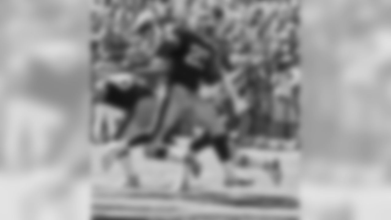 2000 -- 49ers running back Charlie Garner.