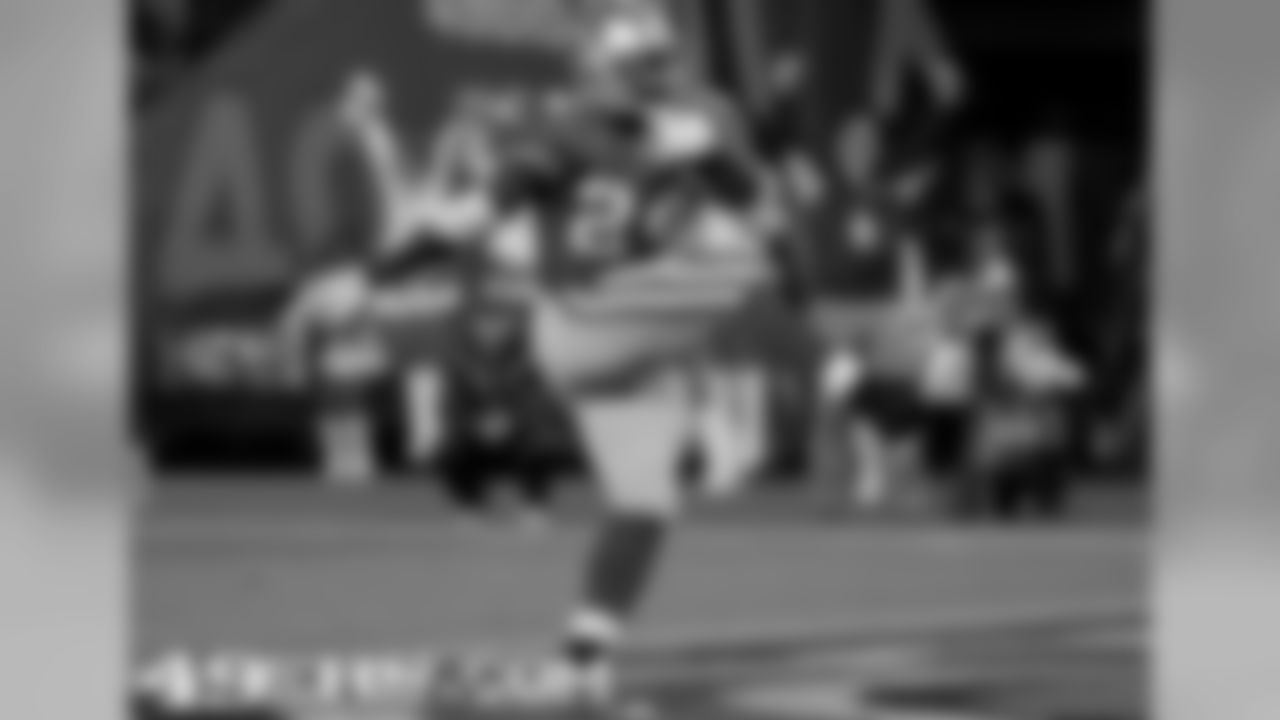 RB Anthony Dixon celebrating his first career TD
