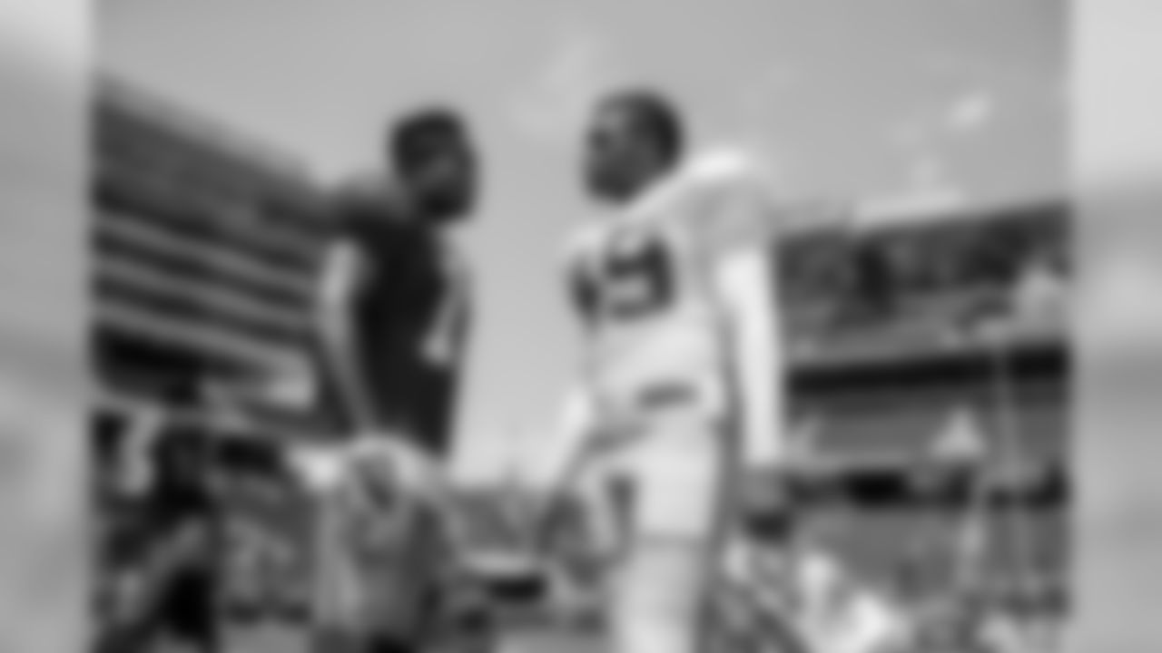 WR Marquise Goodwin and DB Lorenzo Jerome