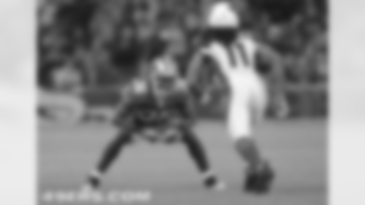 Lloyd captured Spencer's focus as he competed against his former college teammate, Larry Fitzgerald.