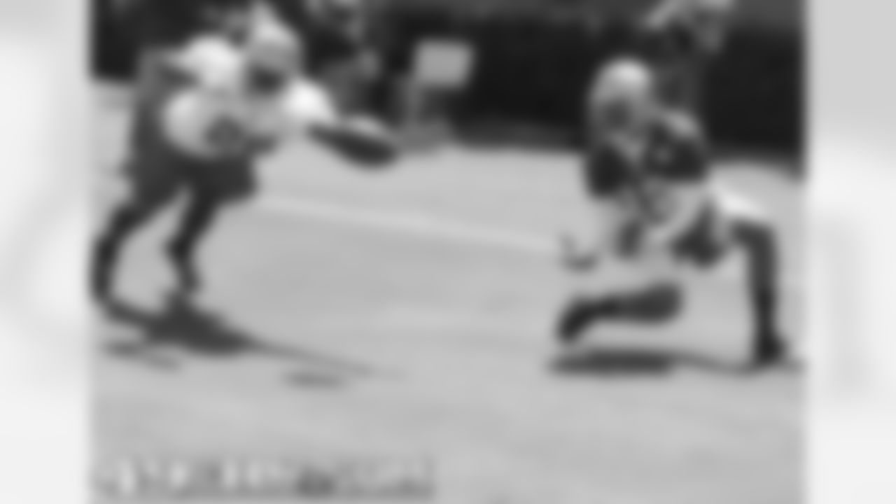 S Curtis Taylor and WR Ted Ginn Jr.