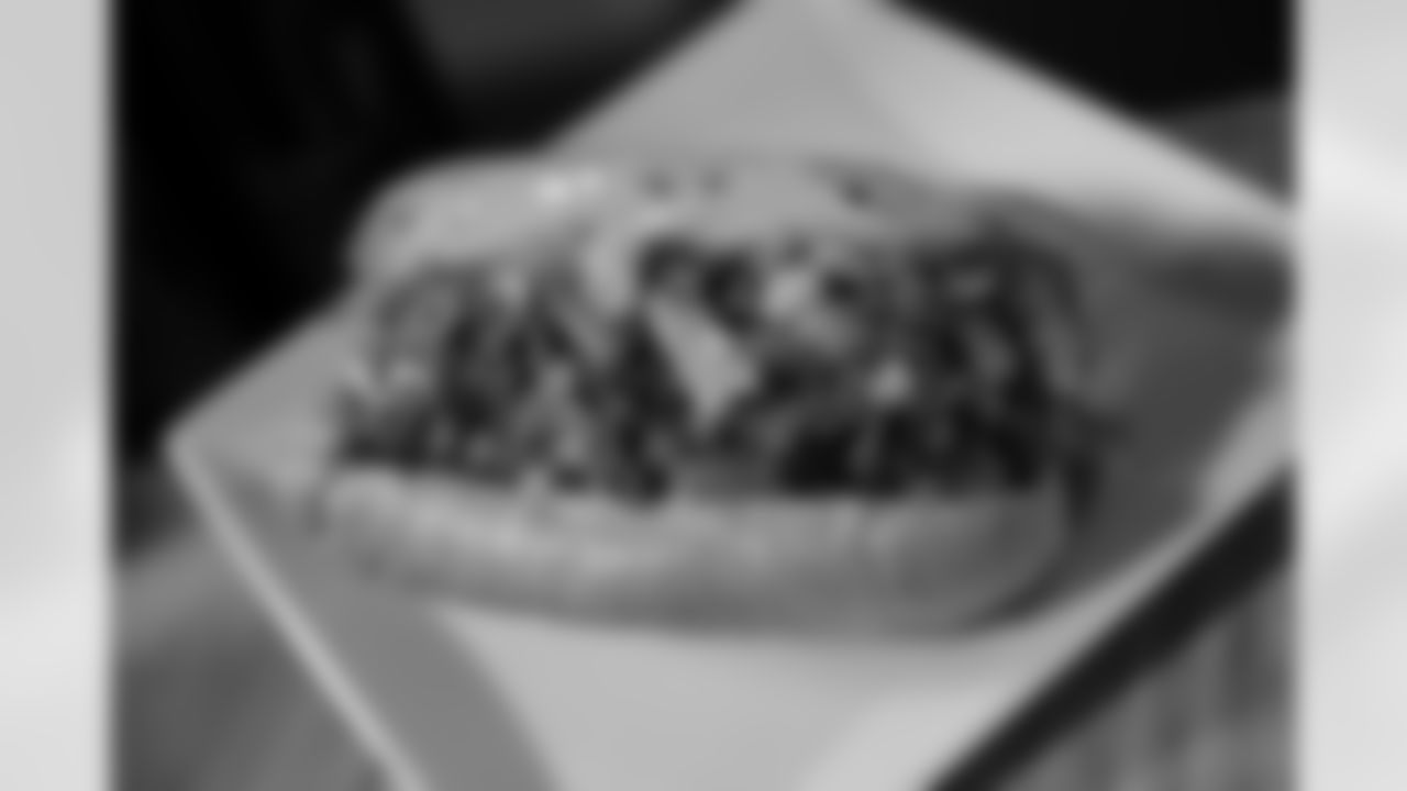 Shaved marinated beef, hot giardiniera, provolone cheese on a buttery soft roll.