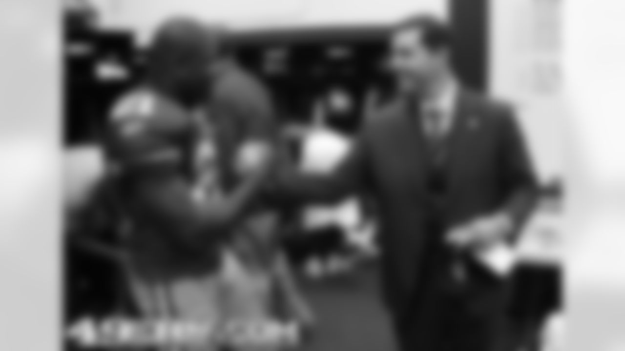 RB Frank Gore and 49ers President & CEO Jed York