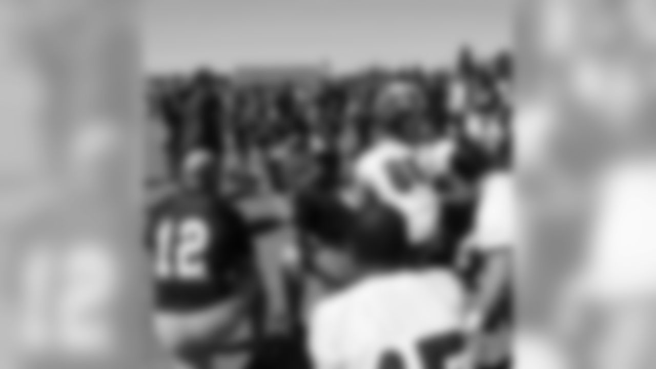 Coach Nolan talks to his team
