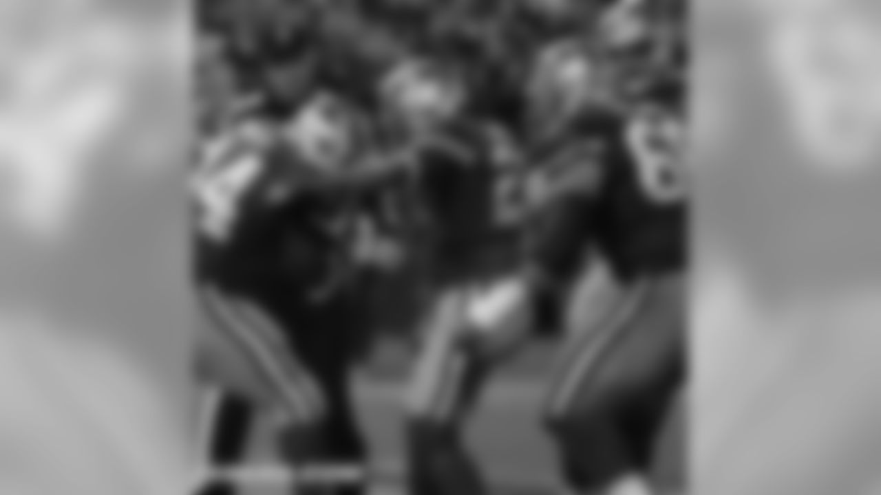 Gore and offense celebrate after punching it in to the end zone.