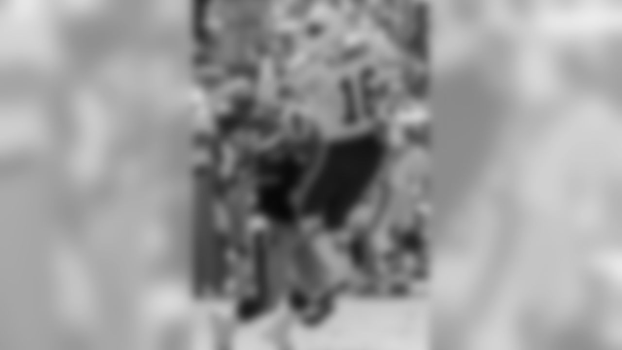 2000 -- 49ers pass-rusher Bryant Young and Cardinals quarterback Jake Plummer.