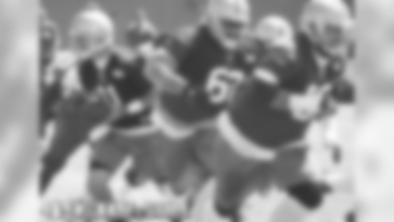 QB Alex Smith, G Chilo Rachal and T Adam Snyder