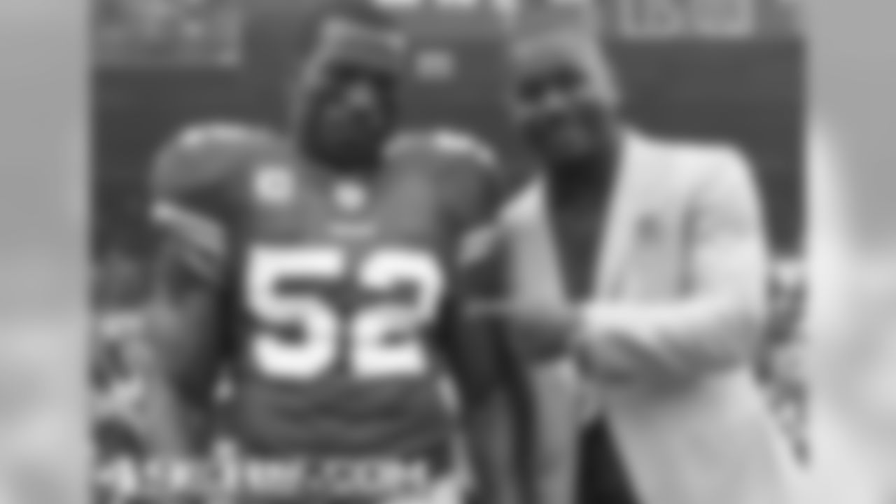 Patrick Willis and Honorary Game Captain Ricky Watters before Rams game