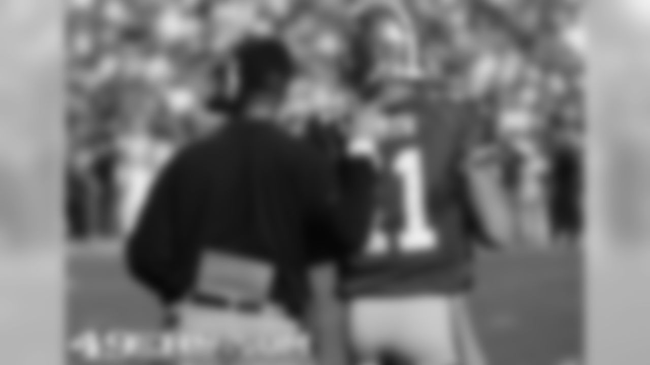 Coach Jim Harbaugh and QB Alex Smith