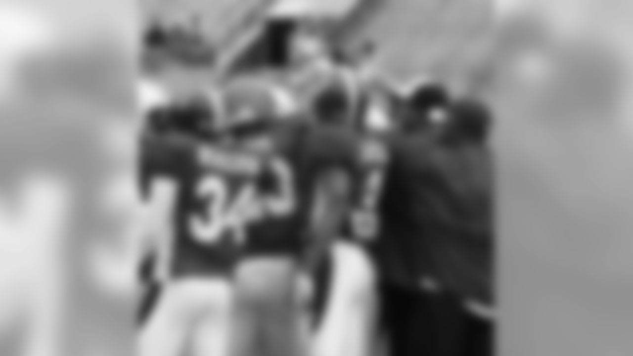 The South secondary gathers for a post practice huddle.