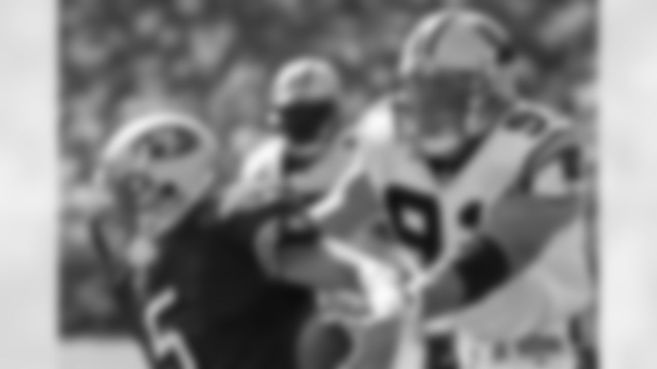 1999 -- 49ers quarterback Jeff Garcia and Panthers pass-rusher Kevin Greene.