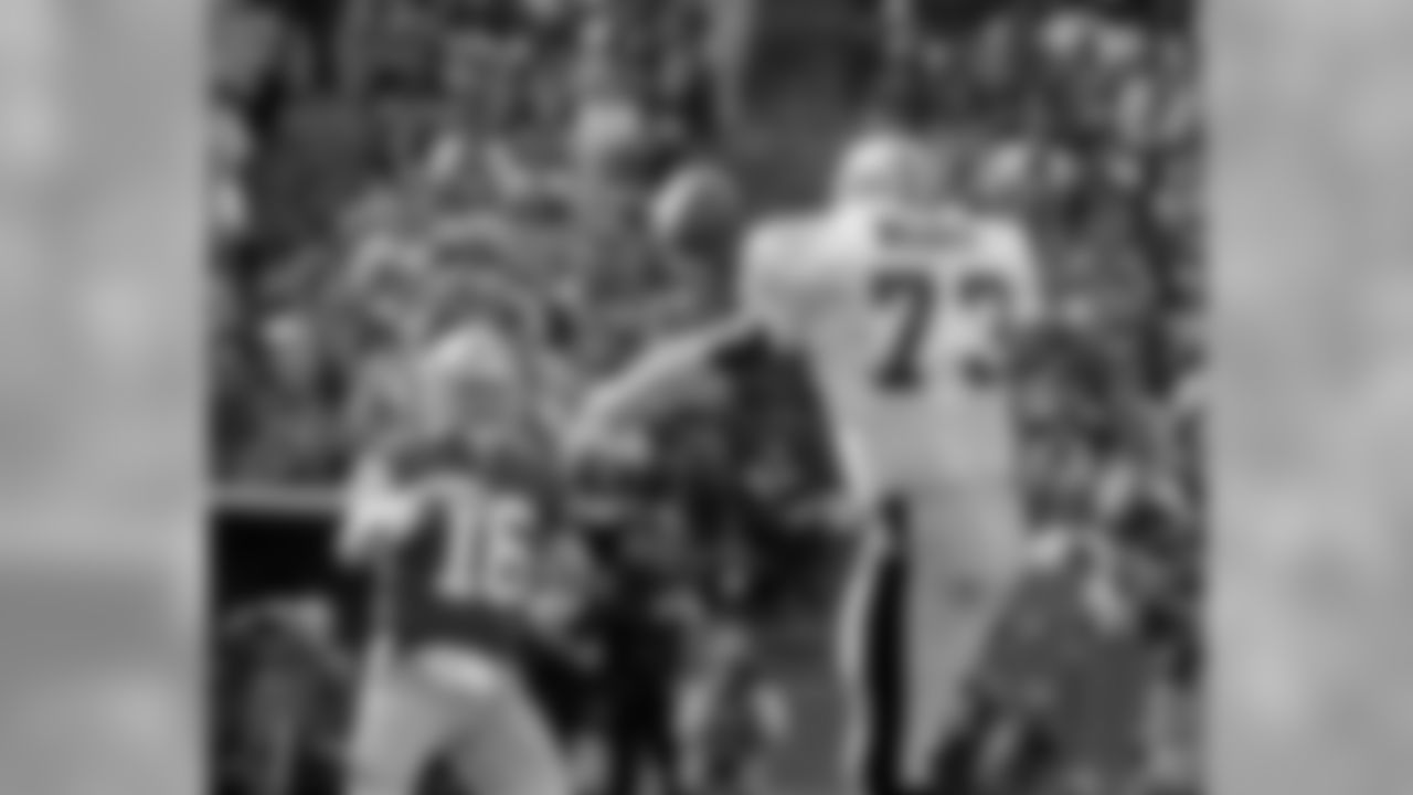 1987 -- Joe Montana of the 49ers, and Frank Warren of the Saints.