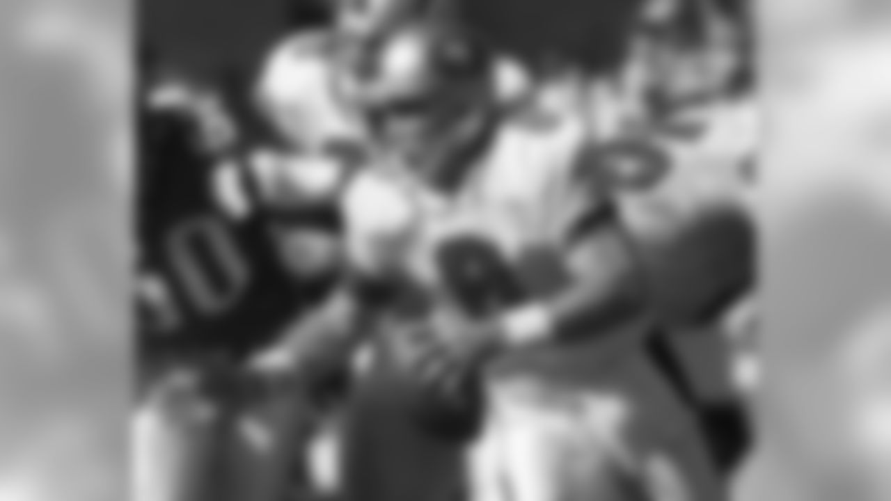Aug. 18, 1997 -- Steve Young rolls out during a preseason game.