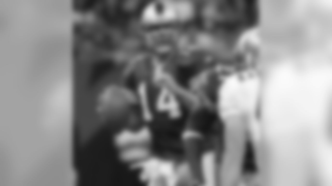 QB JT O'Sullivan scores on a 5-yard TD to Isaac Bruce, but was picked off t