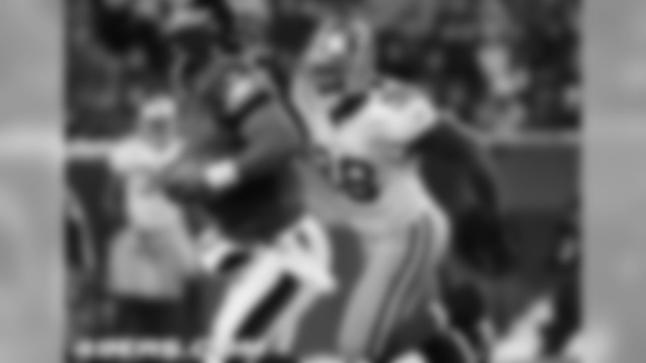 Haralson chased down Donovan McNabb.