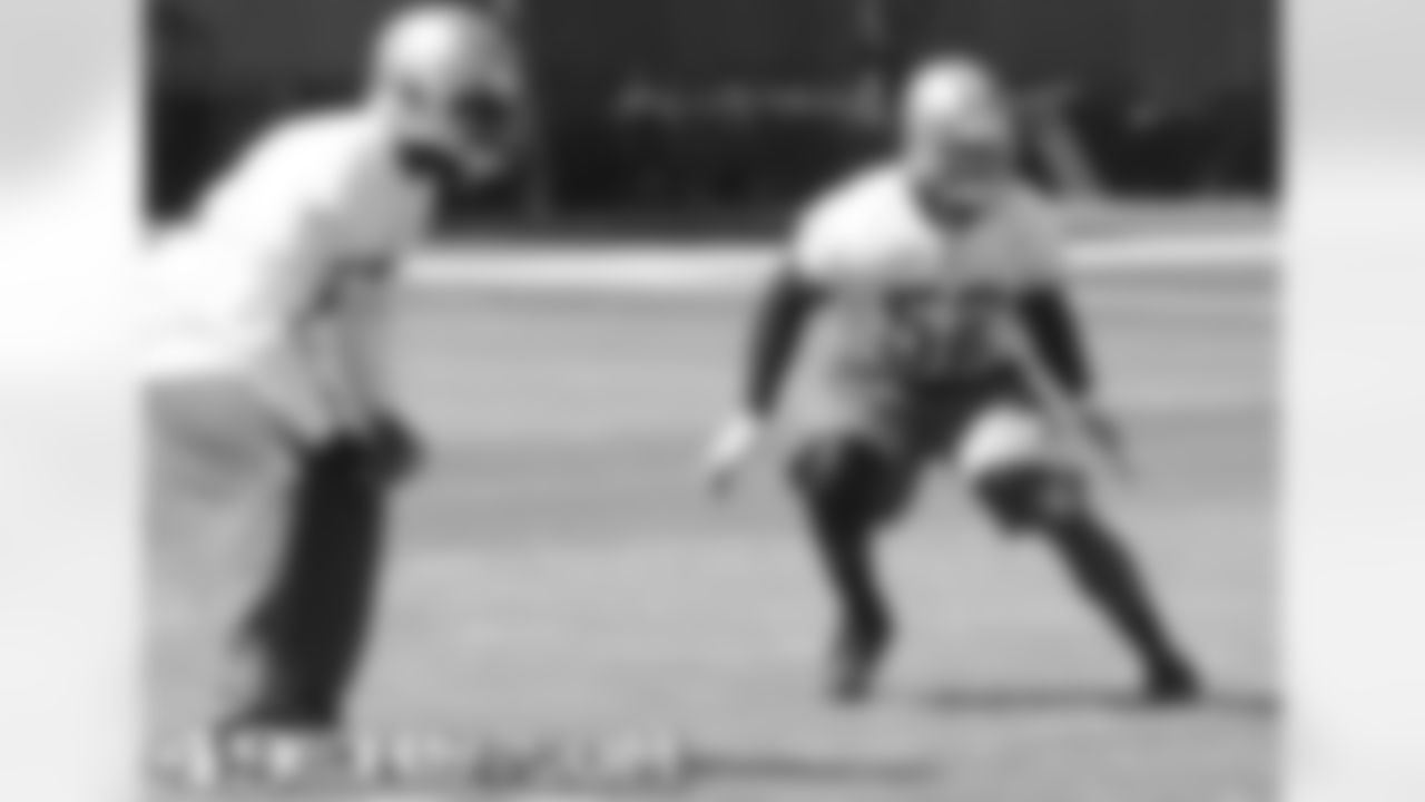 S Michael Lewis and LB Patrick Willis