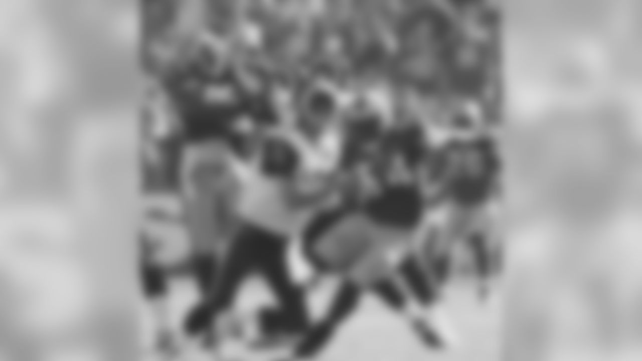 OLB Rod Green pressures the quarterback