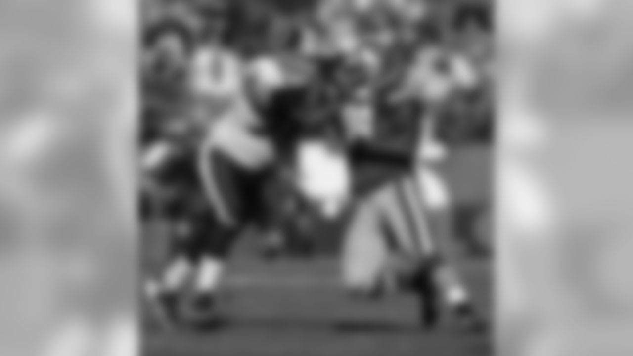 OLB Parys Haralson rushes off the edge