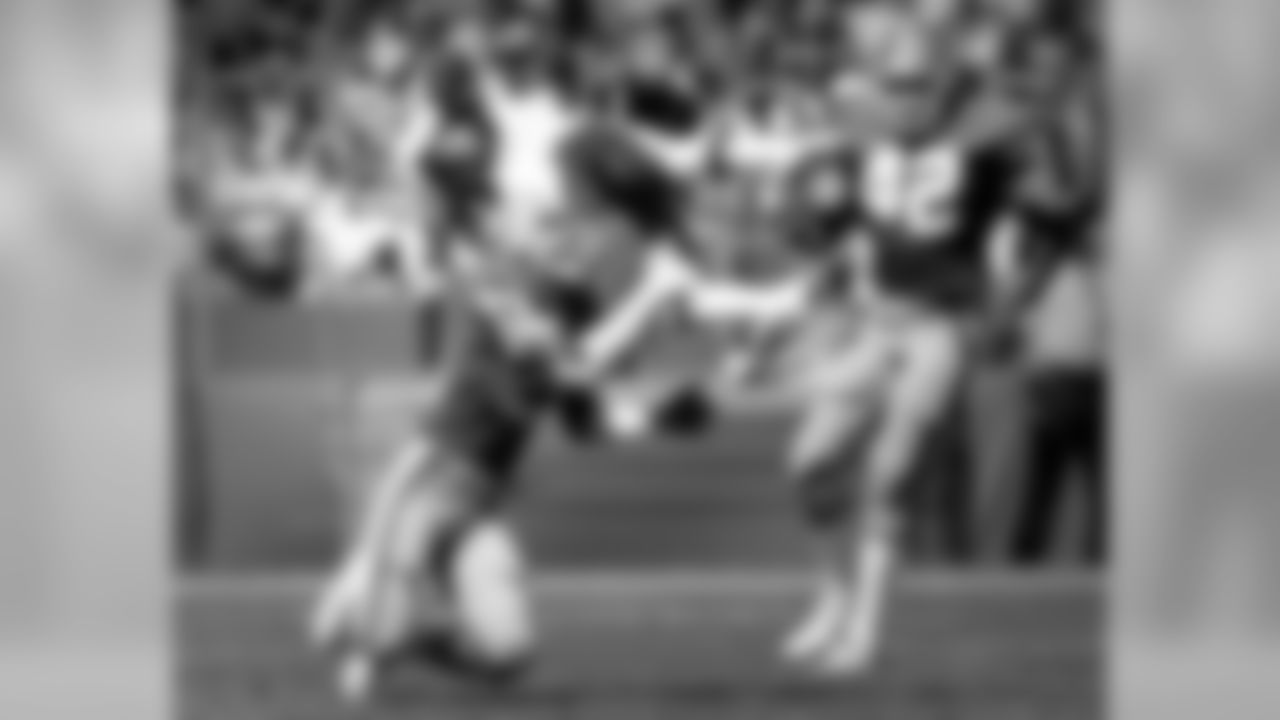 1990 -- Redskins wideout Ricky Sanders and 49ers defensive back Don Griffin.