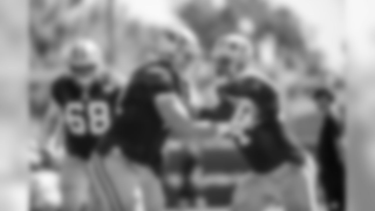 OL John Theus and T Joe Staley